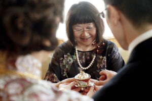 Mother receiving tea in Chinese tea ceremony