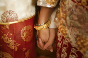 Bride and groom holding hands