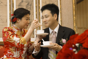 Bride feeding groom